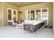 Comfortable outdoor living space with plush seating, coffee table, and heater for cozy gatherings at 8419 Pippen Dr, Orlando, FL 32836