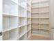 A large pantry showcases ample shelving for organized storage at 8419 Pippen Dr, Orlando, FL 32836