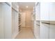 Well-organized walk-in closet with shelving and drawers for efficient storage at 8419 Pippen Dr, Orlando, FL 32836