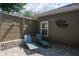 Backyard paver patio with privacy fence and potted plants at 920 Cool Springs Cir, Ocoee, FL 34761