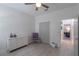 Well-lit bedroom featuring modern finishes, a ceiling fan, and neutral paint at 920 Cool Springs Cir, Ocoee, FL 34761