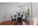 Cozy dining space with modern lighting and bright shuttered windows at 920 Cool Springs Cir, Ocoee, FL 34761