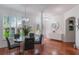 Elegant dining area with a modern chandelier and large windows at 920 Cool Springs Cir, Ocoee, FL 34761