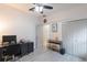 Office features a desk, large closet and ceiling fan at 920 Cool Springs Cir, Ocoee, FL 34761