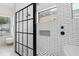Modern bathroom with glass-enclosed shower, subway tile, and stylish finishes at 960 Brightwater Cir, Maitland, FL 32751