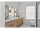 Bright bathroom featuring double vanity, modern fixtures, and plenty of natural light at 960 Brightwater Cir, Maitland, FL 32751