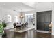 Spacious dining area featuring hardwood floors, modern light fixtures, and an open layout at 960 Brightwater Cir, Maitland, FL 32751