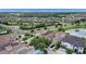 Beautiful aerial view of a Primary-planned community with lakes, trees, and well-manicured streets at 970 Golden Bear Dr, Reunion, FL 34747