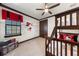 Cozy bedroom with unique Mickey Mouse themed wall decor and rustic bunk beds at 970 Golden Bear Dr, Reunion, FL 34747