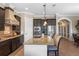 Well-equipped kitchen features an island, ample counter space, and modern appliances at 970 Golden Bear Dr, Reunion, FL 34747