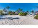 A fun community sand volleyball court next to pool with waterpark features at 970 Golden Bear Dr, Reunion, FL 34747