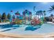 Colorful water park with slides and interactive play areas, creating a fun and engaging environment for  at 970 Golden Bear Dr, Reunion, FL 34747