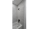 Bathroom featuring a tub and tile surround at 1005 Randall St, Orlando, FL 32805