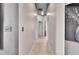 Hallway featuring neutral paint colors and tile flooring at 10293 Cypress Knee Cir, Orlando, FL 32825