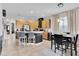 Open concept kitchen with a large island and eat in dining area at 10293 Cypress Knee Cir, Orlando, FL 32825
