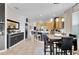 Open concept kitchen with an island, seating and eat in dining area at 10293 Cypress Knee Cir, Orlando, FL 32825