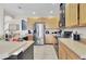 Well-equipped kitchen with stainless steel appliances and ample counter space at 10293 Cypress Knee Cir, Orlando, FL 32825