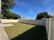 Fenced backyard offers a private and spacious outdoor area for relaxation and activities at 107 Grove St, Orlando, FL 32835