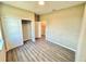 Spacious bedroom features light walls, modern floors, and a convenient closet space at 107 Grove St, Orlando, FL 32835