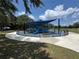 Colorful, shaded playground in a park, perfect for children to enjoy outdoor activities at 107 Grove St, Orlando, FL 32835