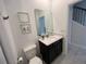Half bath with modern fixtures and decor at 1078 Splash Shot Pl, Davenport, FL 33896