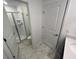 Bathroom featuring a glass enclosed shower, toilet, and sink at 1078 Splash Shot Pl, Davenport, FL 33896