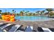 Spacious pool area with lounge chairs and colorful floatation devices at 1078 Splash Shot Pl, Davenport, FL 33896