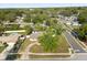 Scenic aerial view of a property nestled in a quiet neighborhood, showcasing its well-manicured lawn at 110 S Edgemon Ave, Winter Springs, FL 32708