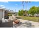 Backyard with an outdoor lounge area and firepit at 110 S Edgemon Ave, Winter Springs, FL 32708