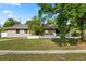 Charming single-story home with well-maintained landscaping and a lovely front yard, offering great curb appeal at 110 S Edgemon Ave, Winter Springs, FL 32708