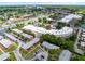 Aerial view showcases the community's location, retail, ample parking, and proximity to various amenities at 117 Georgetown Dr # C, Casselberry, FL 32707
