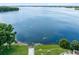 Lakeside retreat features a boat ramp, providing easy access to the water for recreational activities and stunning views at 117 Georgetown Dr # C, Casselberry, FL 32707