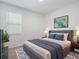 Comfortable bedroom with plush carpeting and stylish decor, offering a relaxing retreat at 12009 Walmsley Aly, Winter Garden, FL 34787