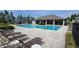 Relaxing community pool with plenty of seating for residents to enjoy the outdoors at 12009 Walmsley Aly, Winter Garden, FL 34787