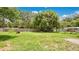 Spacious backyard featuring a fire pit, offering plenty of room for outdoor entertaining at 1202 Randolph St, Sanford, FL 32771