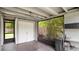 Enclosed patio with ample space, perfect for outdoor relaxation and entertaining at 1202 Randolph St, Sanford, FL 32771