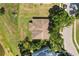 Aerial view of home near the water showing roof and large yard at 1227 Juniper Hammock St, Winter Garden, FL 34787
