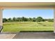 Backyard view featuring a large pond and natural scenery at 1227 Juniper Hammock St, Winter Garden, FL 34787