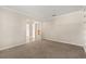 Spacious living room with light-colored paint and neutral carpeting at 1227 Juniper Hammock St, Winter Garden, FL 34787