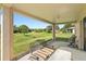 Outdoor patio with furniture, green grass, and view of the beautiful community at 1227 Juniper Hammock St, Winter Garden, FL 34787