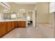 A primary bathroom features a double vanity, tub, tile floor, and access to the primary bedroom at 14036 Cherry Bush Ct, Orlando, FL 32828