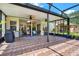 Spacious outdoor patio with ceiling fans, perfect for entertaining and enjoying the beautiful weather at 14036 Cherry Bush Ct, Orlando, FL 32828