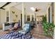 Relaxing patio space with cozy rocking chairs, ideal for unwinding and enjoying the tranquil atmosphere at 14036 Cherry Bush Ct, Orlando, FL 32828