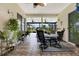 Inviting patio area with comfortable seating, perfect for outdoor dining and enjoying the serene surroundings at 14036 Cherry Bush Ct, Orlando, FL 32828