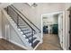 Staircase view of landing and office space at 14205 Conifer Dr, Orlando, FL 32832