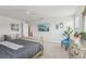 Bedroom featuring ceiling fan, king bed with nightstands, and sitting chairs at 1450 Chelsea Manor Cir, Deland, FL 32724