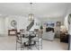 Open concept view of the dining room, stairs, and living room at 1450 Chelsea Manor Cir, Deland, FL 32724