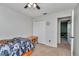 Bedroom with double closet and a private access to a personal bath at 16386 Se 156Th Place Rd, Weirsdale, FL 32195