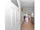 Inviting entryway featuring tiled floors and an open view into the dining and living areas at 16386 Se 156Th Place Rd, Weirsdale, FL 32195