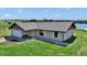 Cozy single-Gathering home with a manicured lawn, gravel landscaping, and a convenient attached garage at 16386 Se 156Th Place Rd, Weirsdale, FL 32195